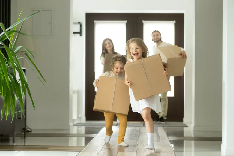 Happy family with storage boxes